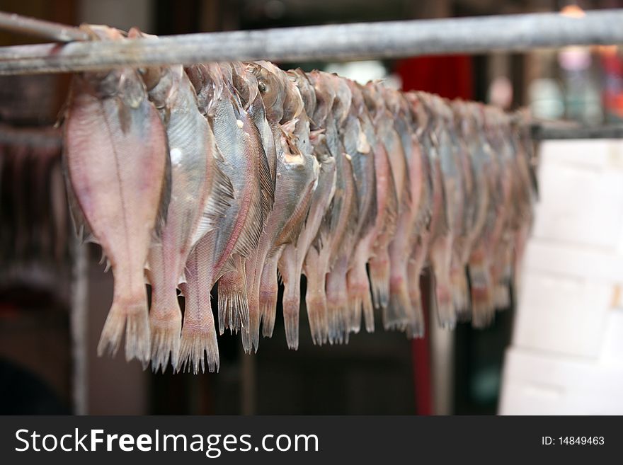 Dried fish cut hangs. The fish market in South Korea, Busan Jagalchi street