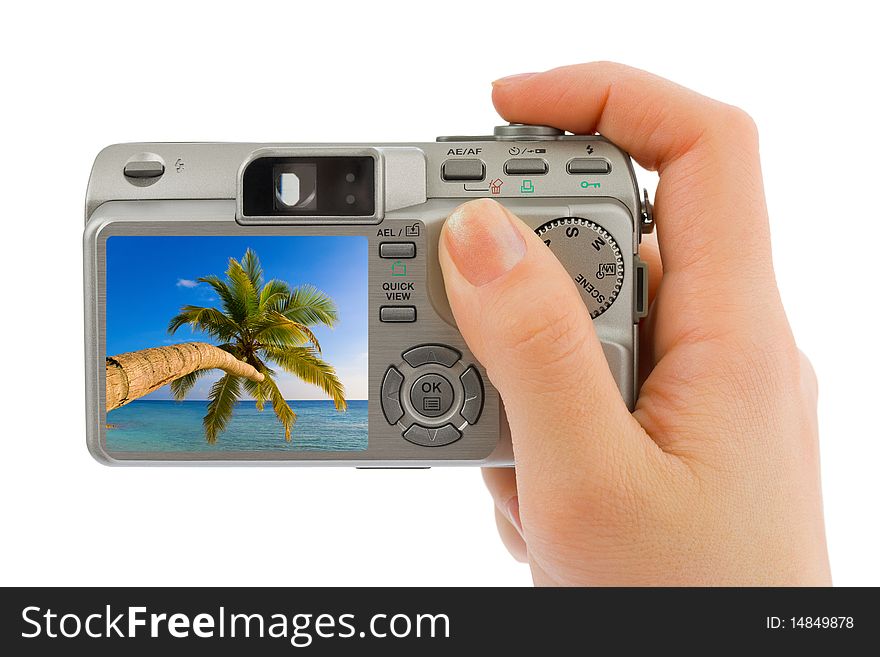 Hand with camera and landscape (my photo) isolated on white background