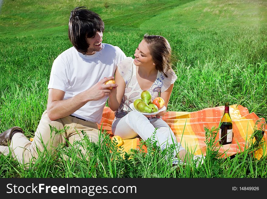 Boy and girl with fruits