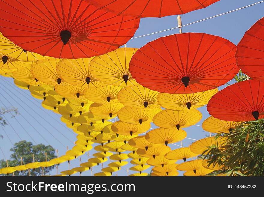 Yellow, Red Paper Umbrellas Decoration As Background