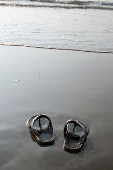 Sandals And Coastline Royalty Free Stock Image Sandals And Coastline Royalty Free Stock Image