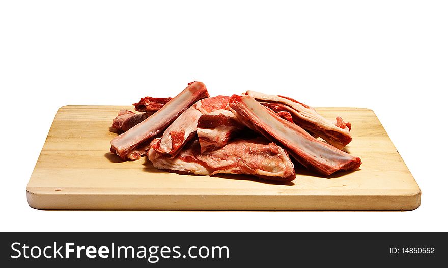 Mutton ribs on chopping board. Mutton ribs on chopping board