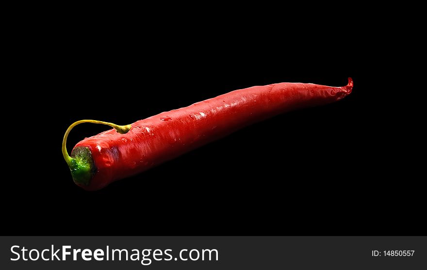 Hot red chili pepper on black background. Hot red chili pepper on black background