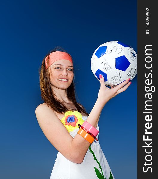 Girl With Ball On Blue Background