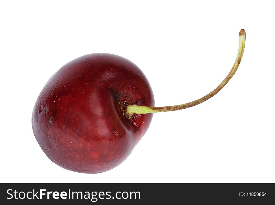 One sweet cherry it is isolated on a white background