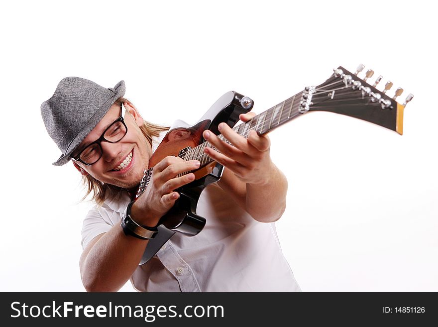Happy young and attractive man with guitar
