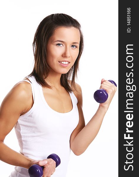 Attractive woman doing fitness exercises. Attractive woman doing fitness exercises