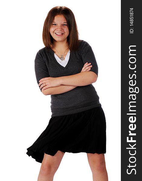 An attractive young teen swishing her black, pleated skirt. An attractive young teen swishing her black, pleated skirt.