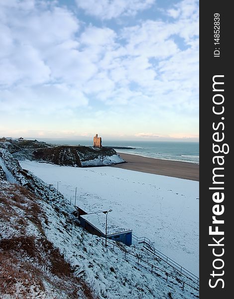 Snow Covered Cliffs With Coast View