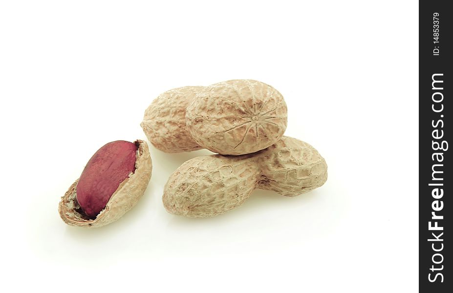 Three peanuts on white background. Three peanuts on white background