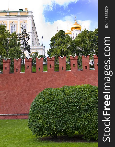 Kind on brick wall of the Kremlin in Moscow