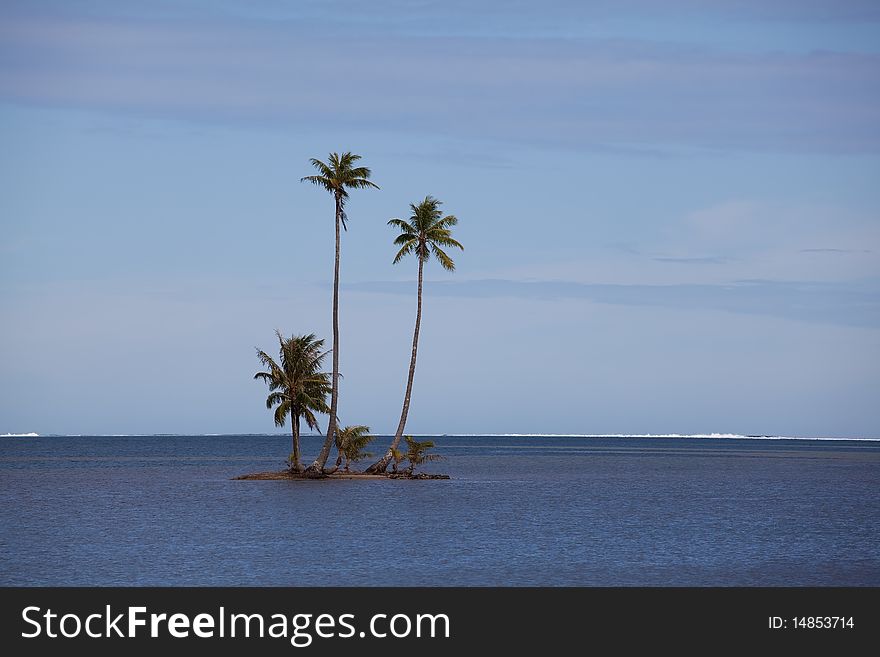 Motu (island) in the South Pacific before the island of Raiatea, French Polynesia. Motu (island) in the South Pacific before the island of Raiatea, French Polynesia.