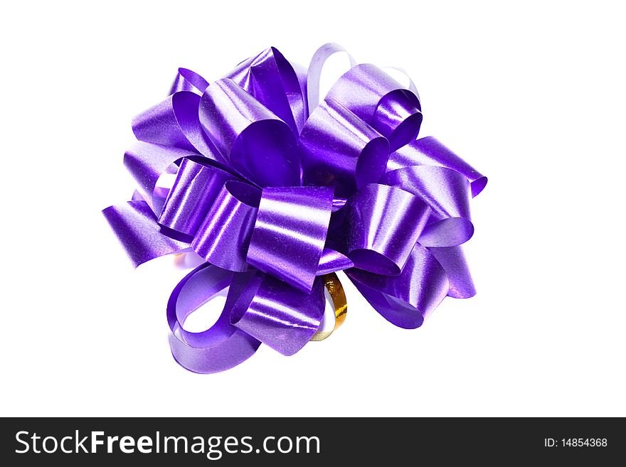 Isolated violet ribbon bow for present box