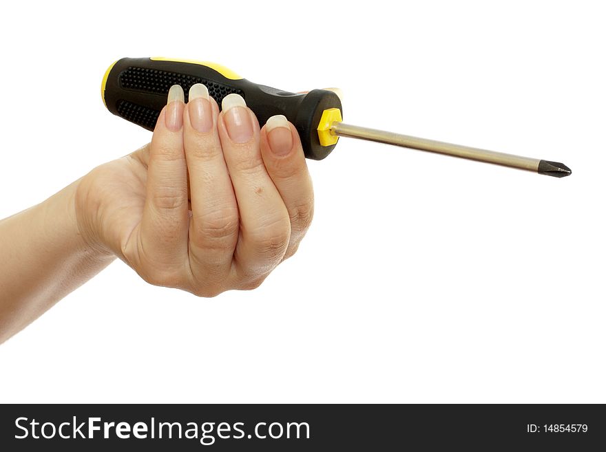 Screwdriver in a beautiful female hand isolated on white background