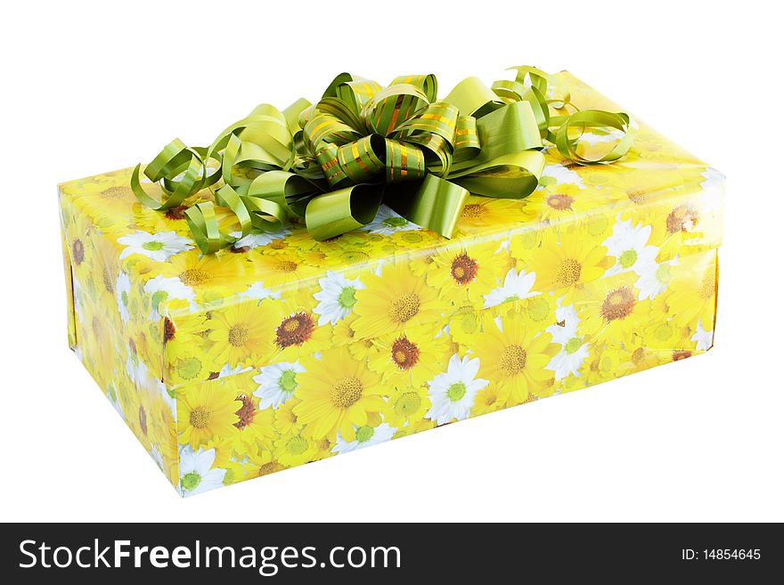 Gift wrapped with a green ribbon / isolated