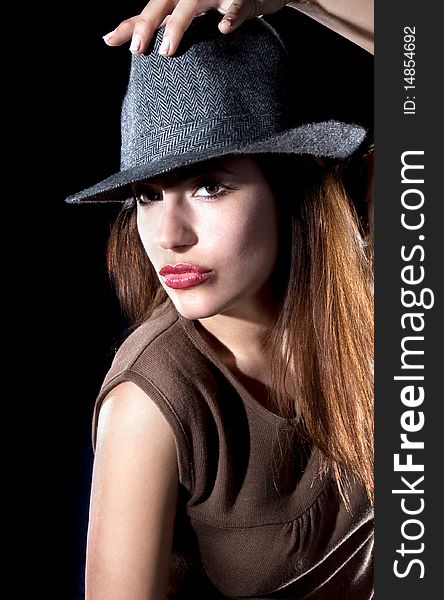 Beautiful fashion woman portrait with grey hat, close up