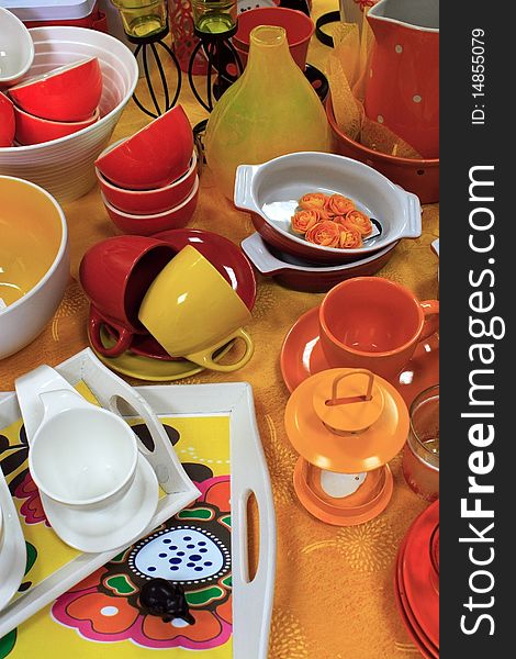 Table with colorful cups and saucers, tea and coffee. Table with colorful cups and saucers, tea and coffee