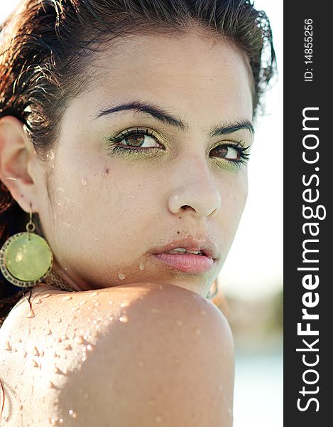 Portrait of beautiful woman relaxing in swimming pool. Portrait of beautiful woman relaxing in swimming pool