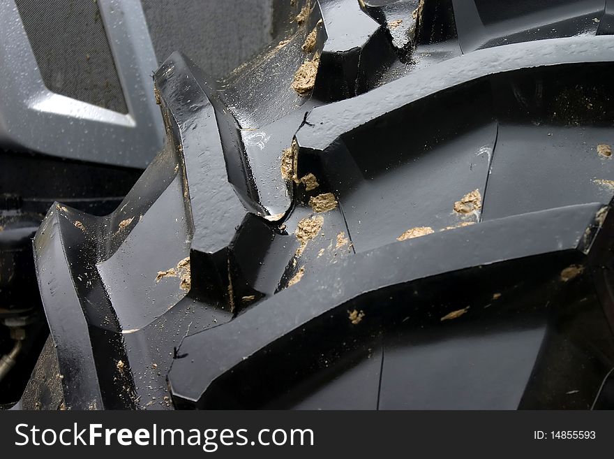 Close-up of tractor tire tread as background. Close-up of tractor tire tread as background.