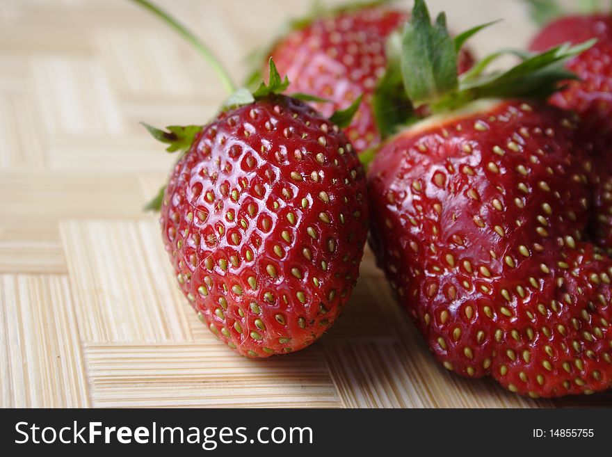 Red strawberries on the table. Red strawberries on the table