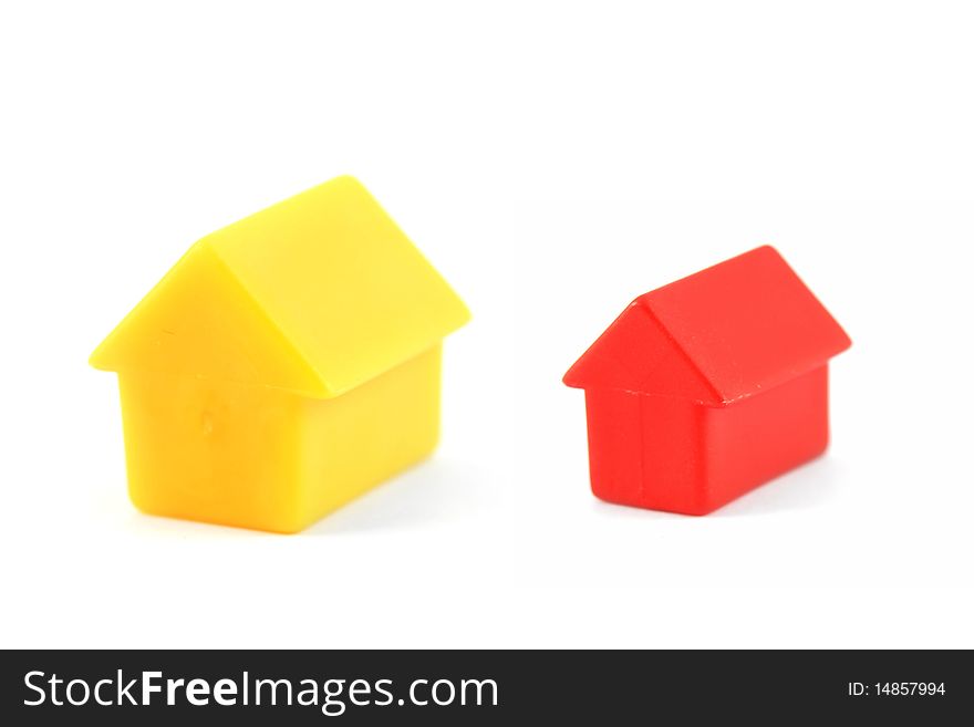 Plastic houses isolated on white background