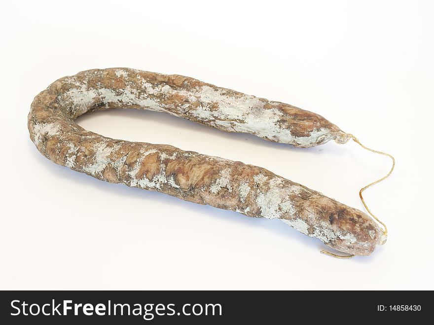 Italian type dry sausage isolated white background. Italian type dry sausage isolated white background