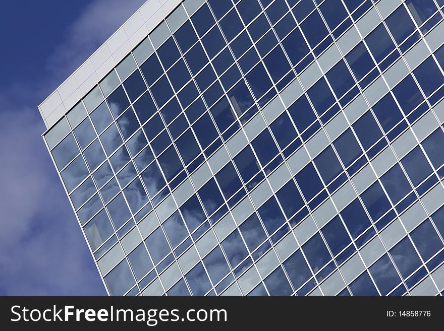Modern Office Building With Cloud Reflection