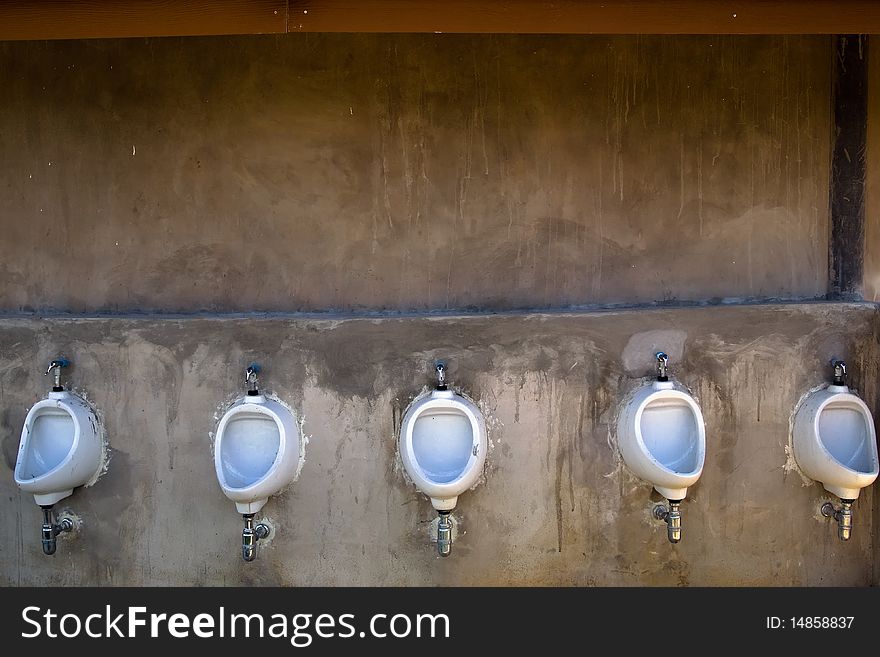 Five men toilet at the outdoor of hotel