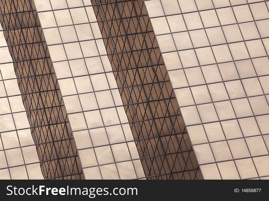 Abstract, looking up at a copper colored modern office building. Horizontal shot. Abstract, looking up at a copper colored modern office building. Horizontal shot.