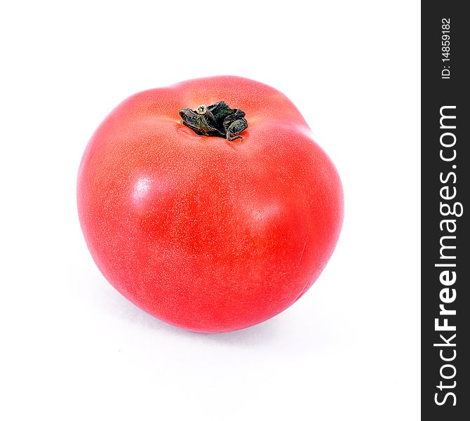 One red tomato isolated on white