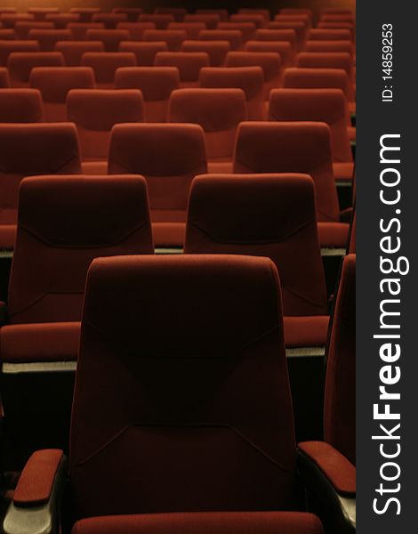 Empty red seats at cinema or theater. Empty red seats at cinema or theater
