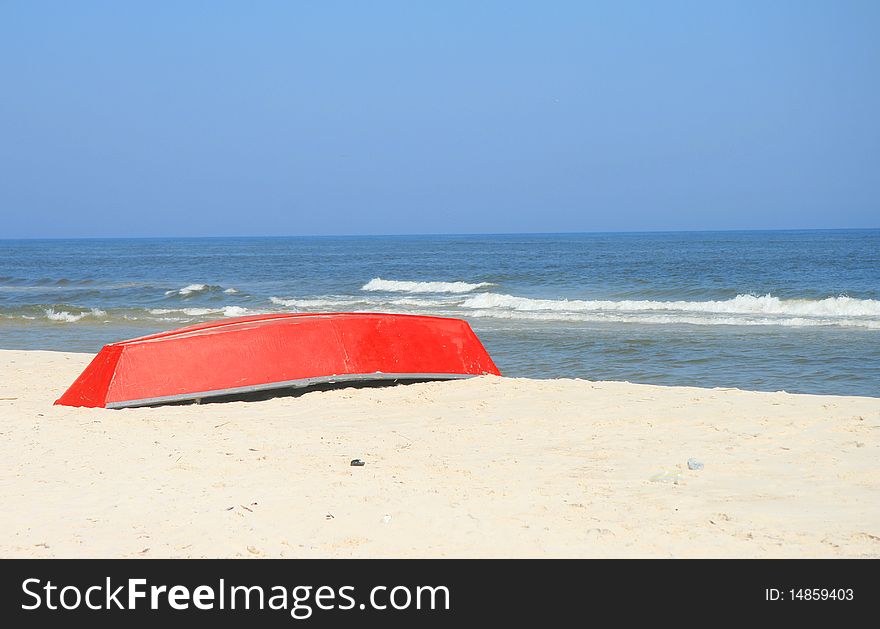 Red Boat On The Beach