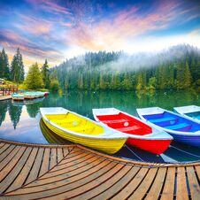 Boats On Majestic Mountain Lake Lacul Rosu Or Red Lake Or Killer Lake Royalty Free Stock Image