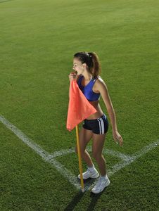 Young Woman On Corner Of Soccer Stadium Royalty Free Stock Photography Young Woman On Corner Of Soccer Stadium Royalty Free Stock Photography