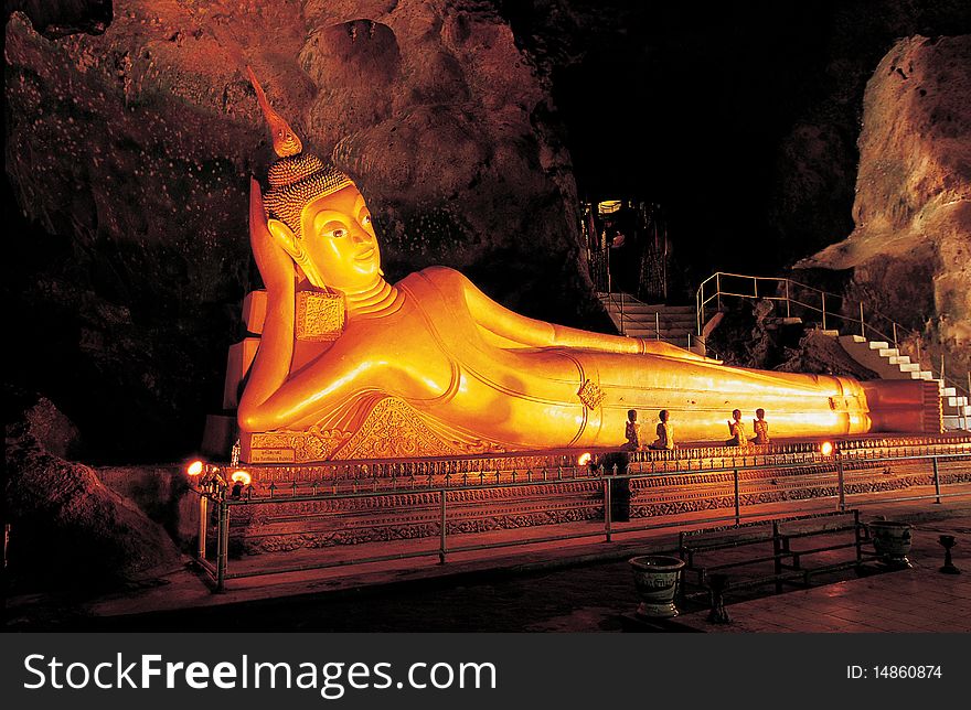 Reclining Buddha image in the cave, Thailand