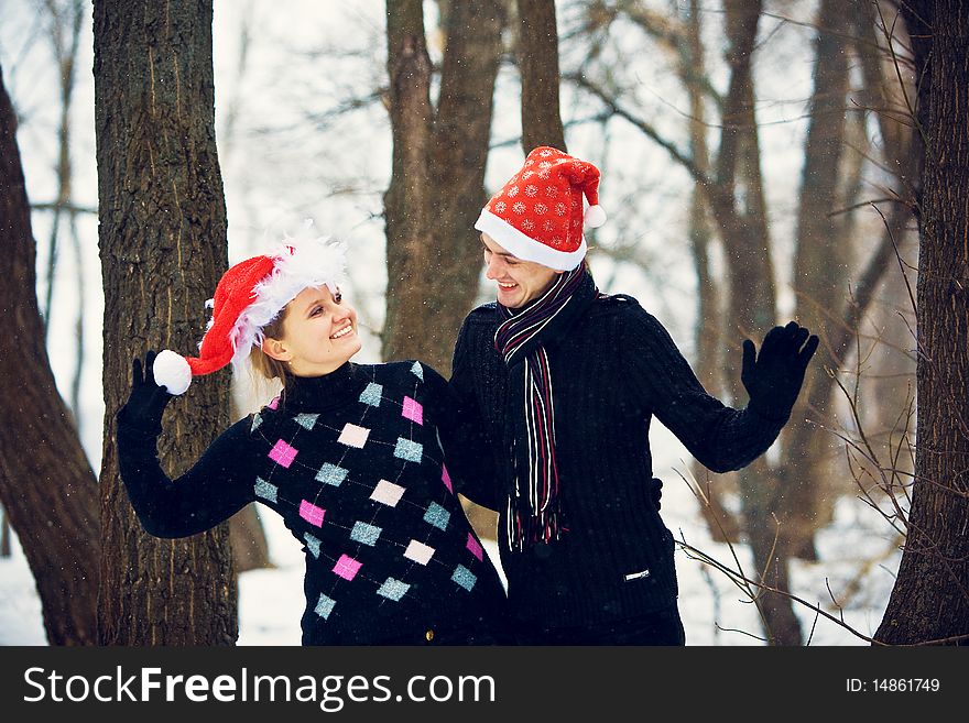 Christmas couple in love in forest