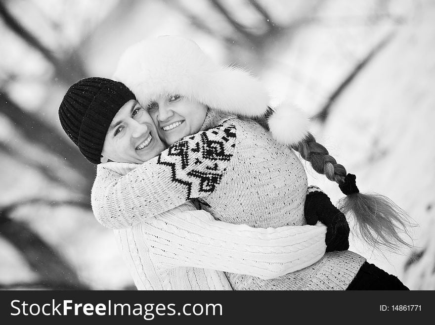 Young couple in love smiling and hugging