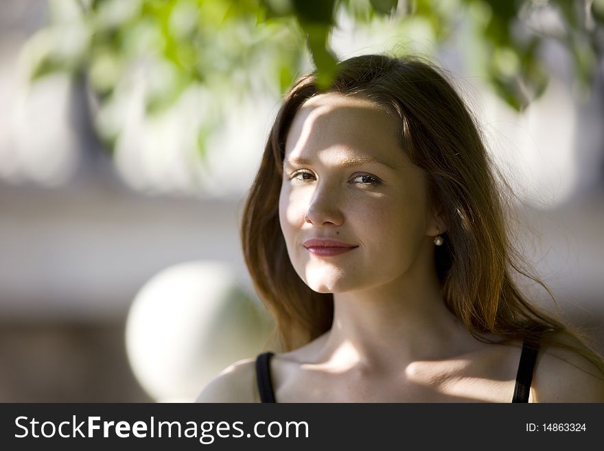 Woman portrait in sunny day look at you. Woman portrait in sunny day look at you