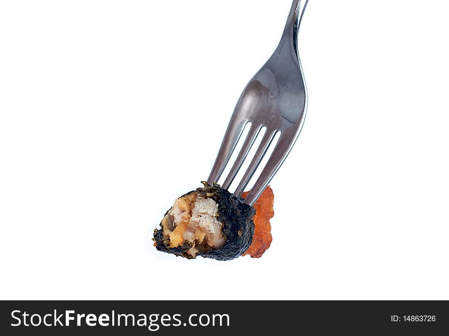 Fried chicken stick with algae roll close up isolated. Fried chicken stick with algae roll close up isolated