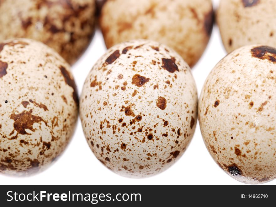 Photo of the quail egg isolated on white