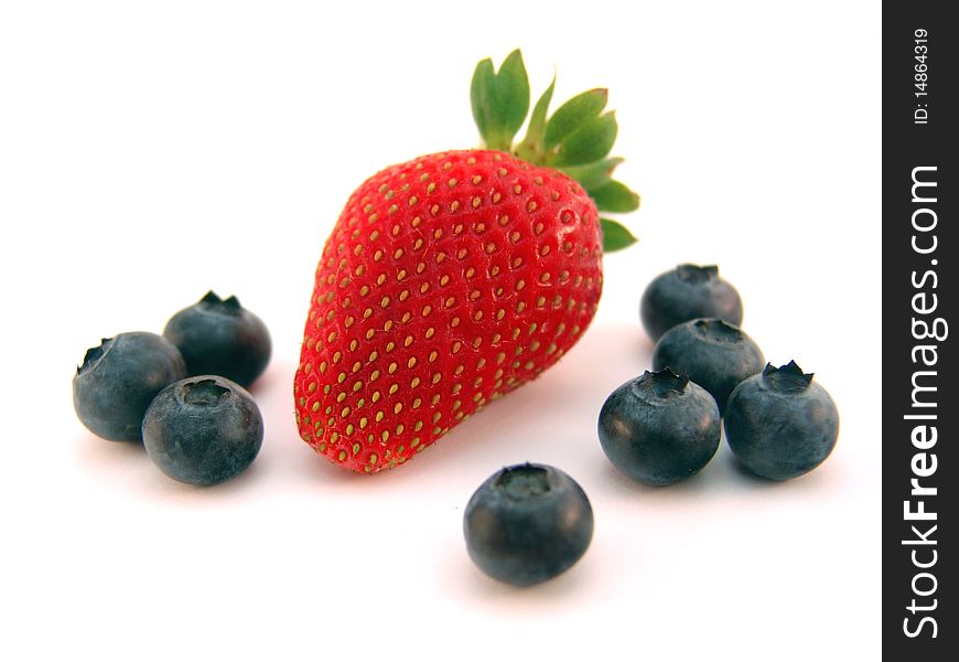Strawberry and blueberries isolated over white background