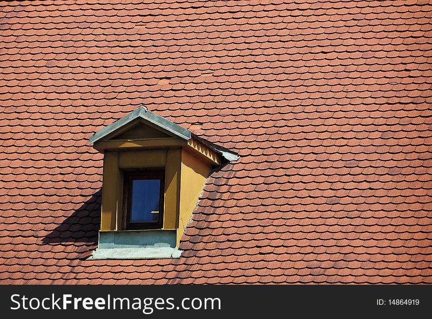 Tiles roof with an attic, prague. Tiles roof with an attic, prague