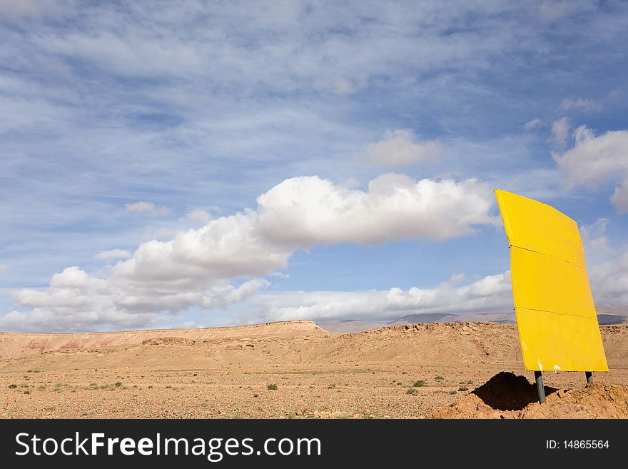Yellow panel in the middle of desert. Yellow panel in the middle of desert