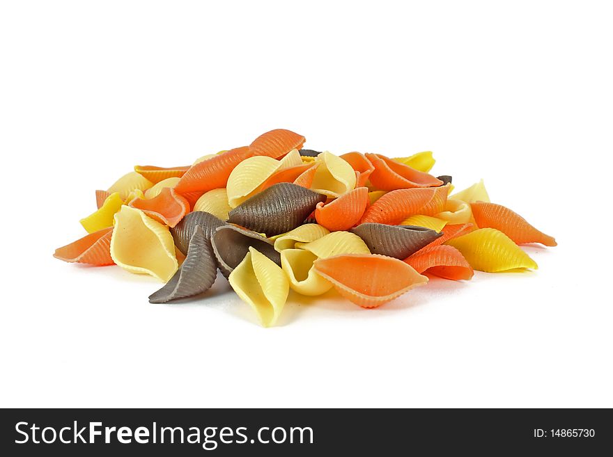 Raw colored pasta isolated on white background