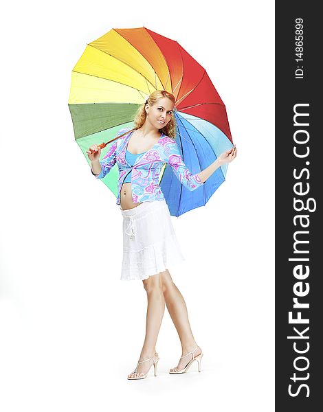 The image of a beautiful pregnant girl with a rainbow umbrella