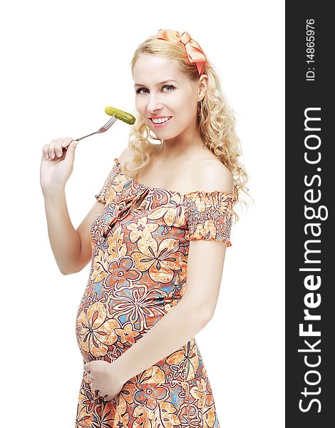 Pregnant woman eats pickled cucumber