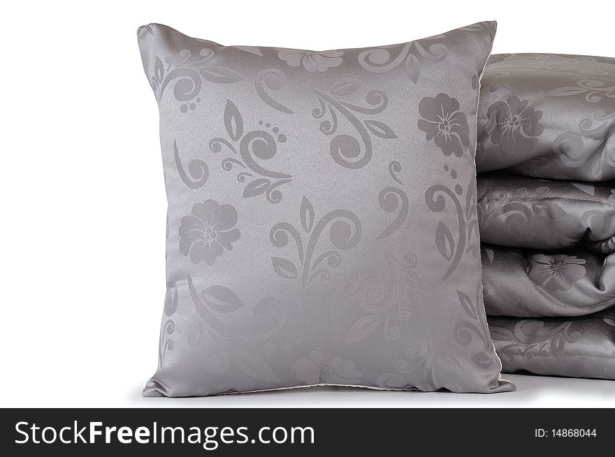 Gray bed spreads with soft pillows. Gray bed spreads with soft pillows.