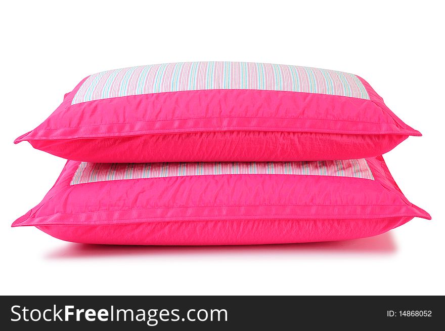 Soft pink pillows isolated over white. Soft pink pillows isolated over white.