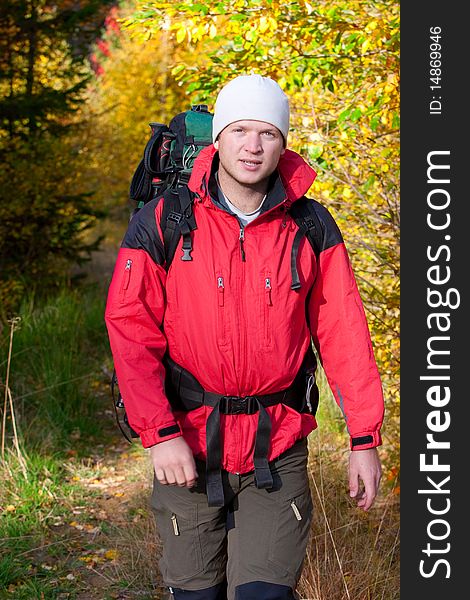 Hiker boy in autumn mountain. Hiker boy in autumn mountain