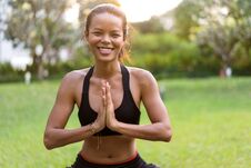 Girl Doing Yoga At Sunset In Thailand In The Park Stock Images